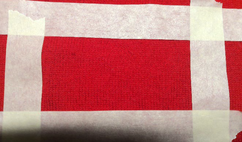 Prøveflaten på ull etter 2 strøk over flaten med en hastighet på 5 cm per sekund. Foto: Weber&Leucht